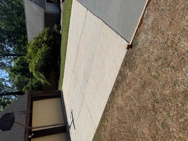 Cracked driveway before replacement